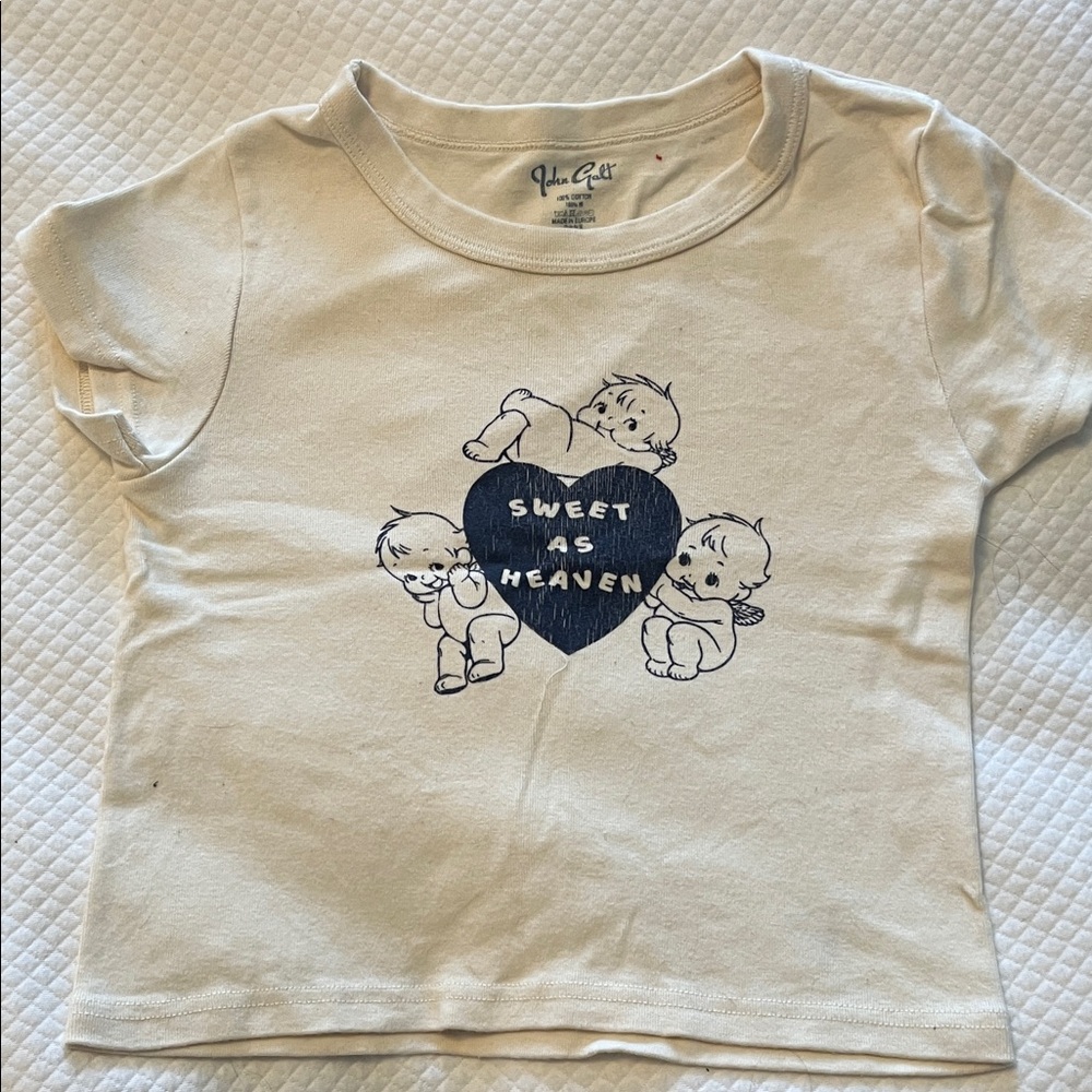 Brandy Melville Cream Tee with Blue Graphic